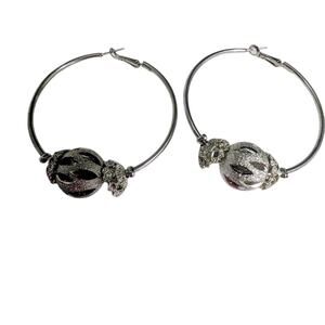 Large hoop vintage 90's silver earrings.